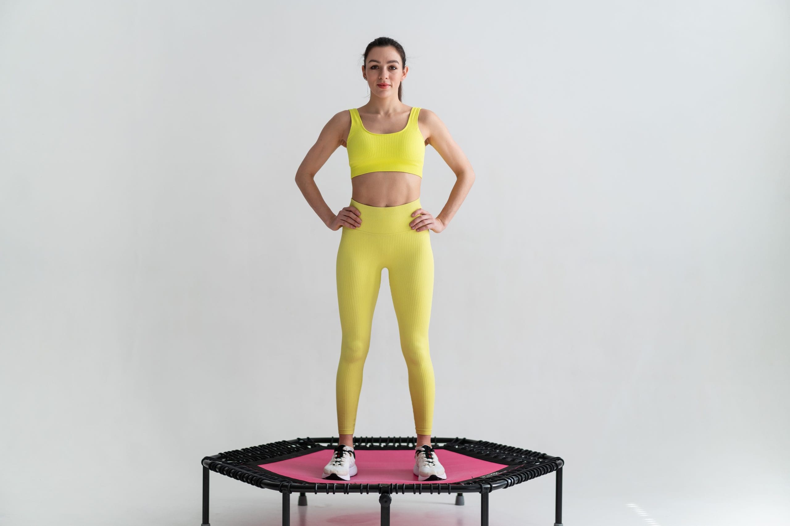 a woman on a mini trampoline showing how rebounder therapy's effect on blood sugar levels is amazing