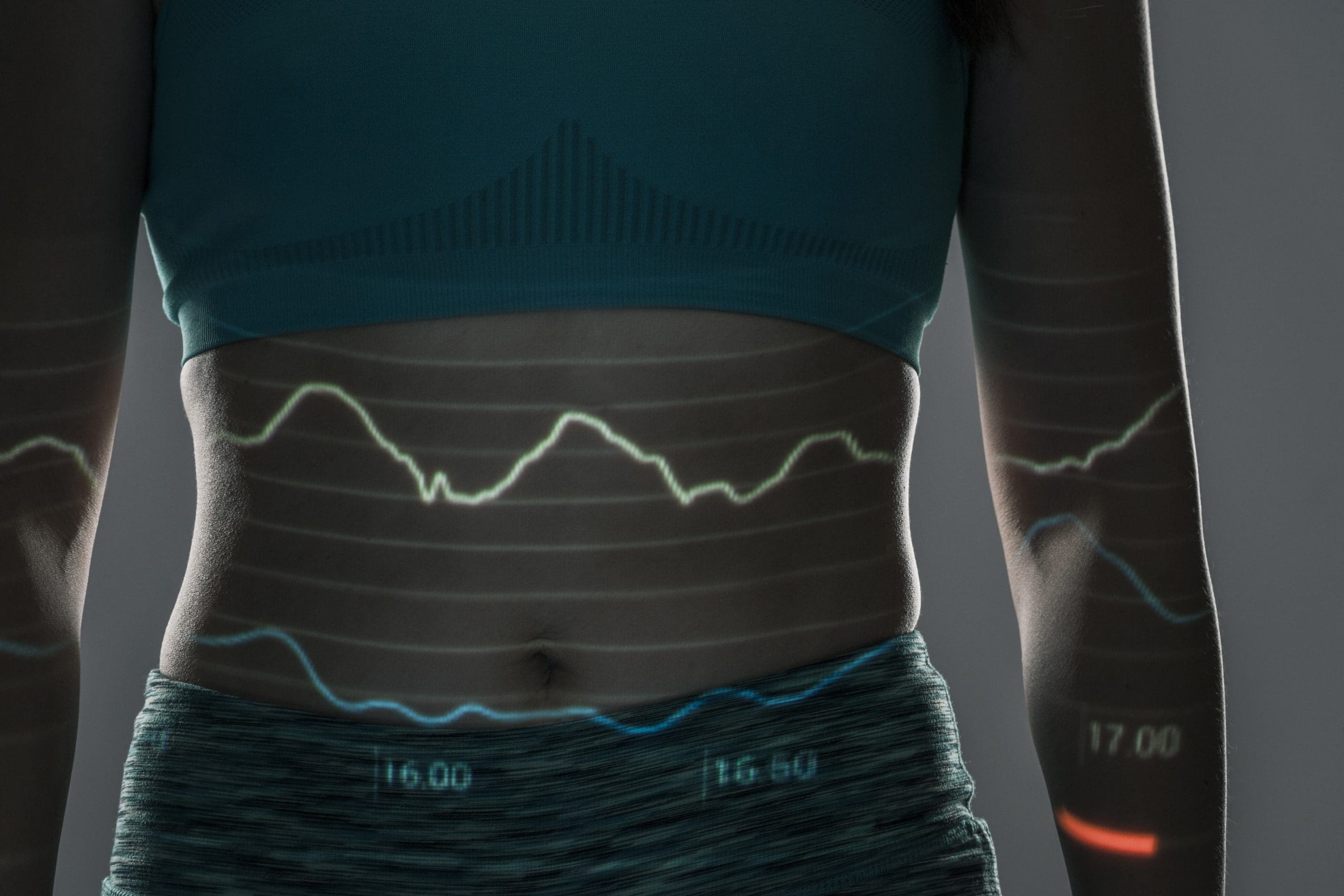 a woman wearing a fitness tracker displaying her stats in a futuristic way, symbolizing ozone sauna boosts energy