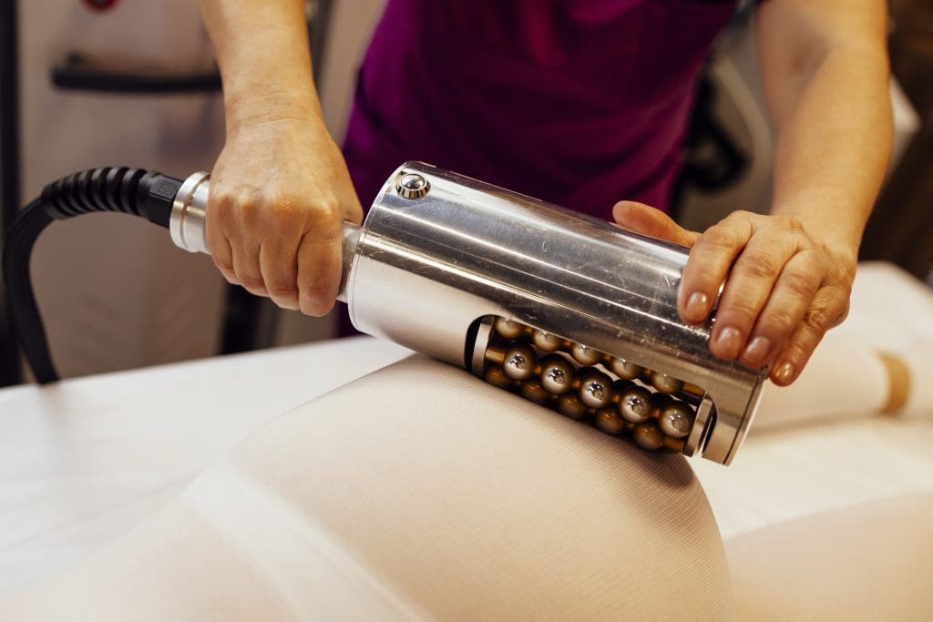 endospheres device being used on a patient to show that endospheres therapy isn't painful