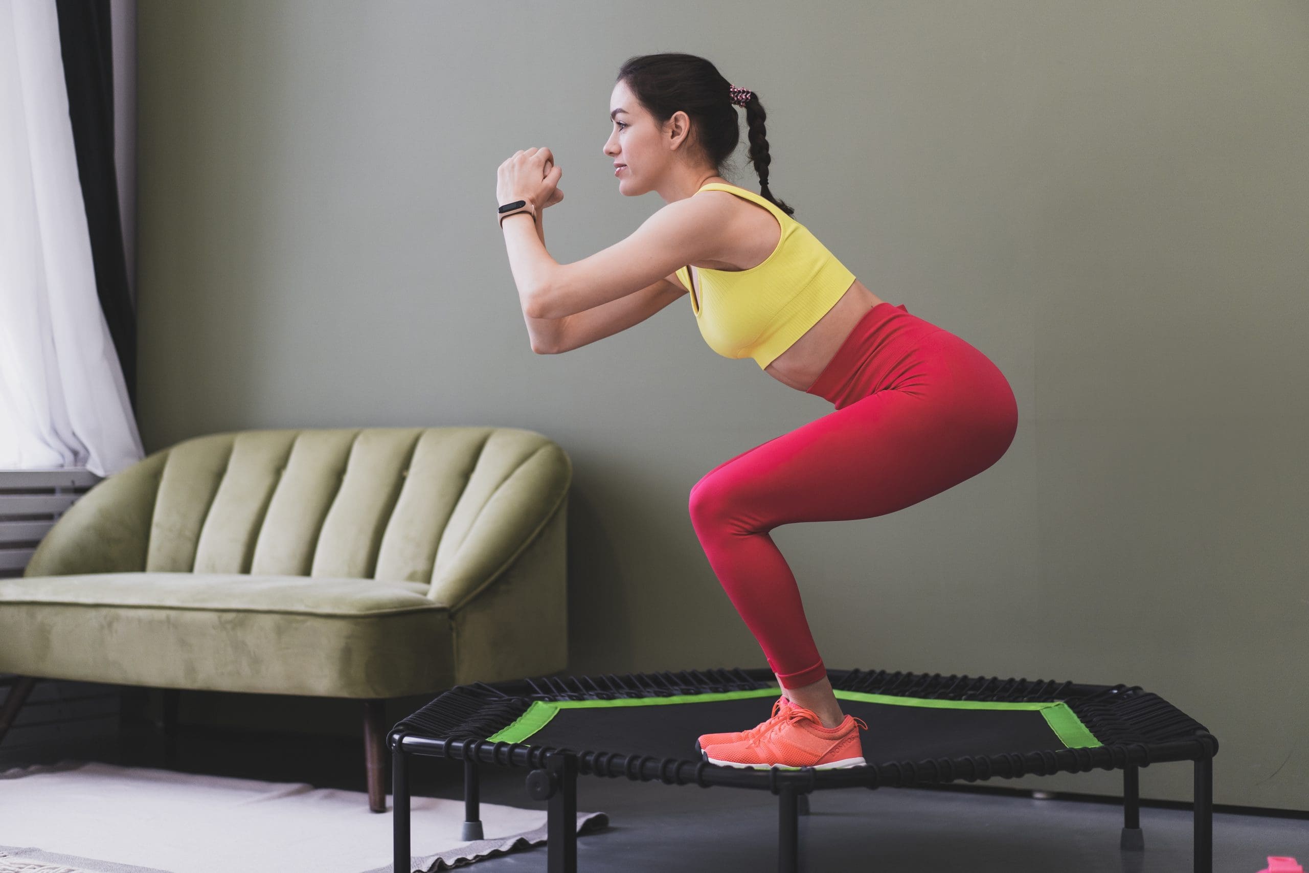 a woman doing rebounder for beginners