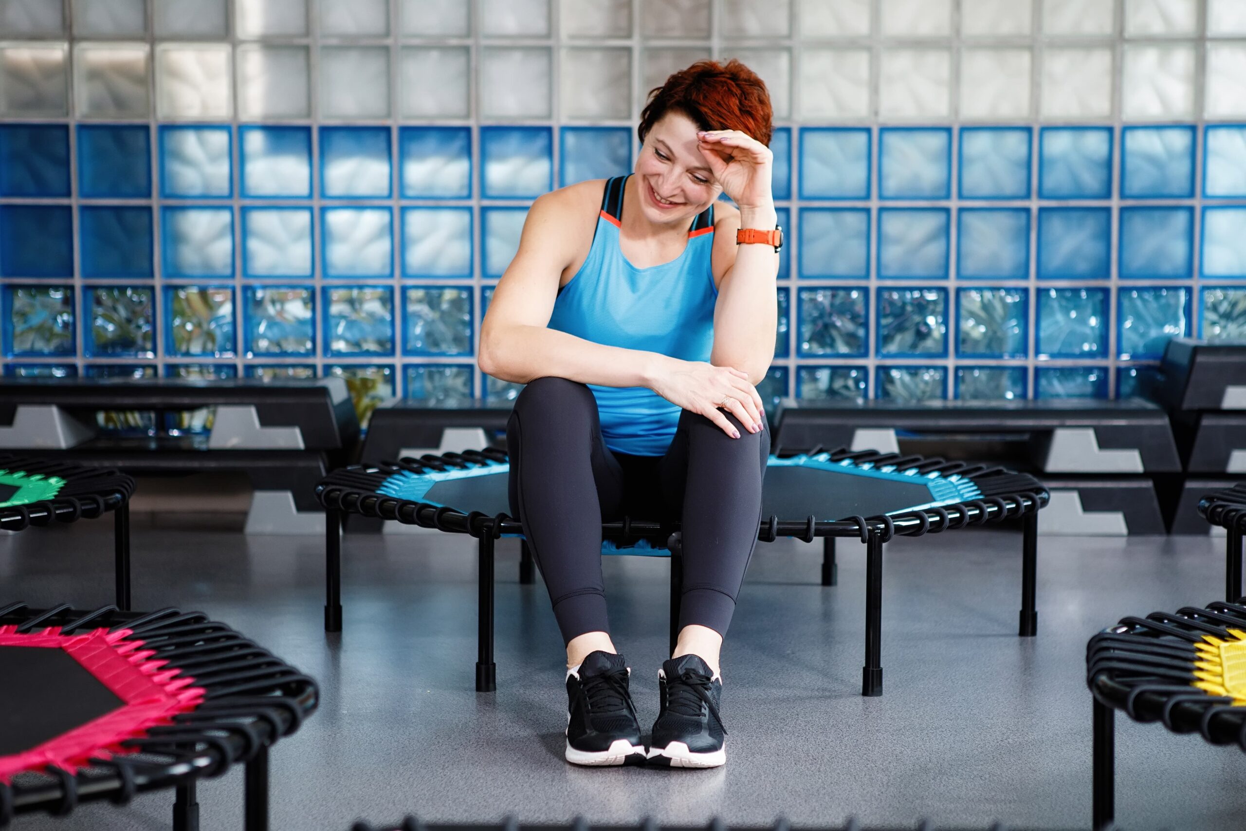Person experiencing rebounding therapy for mental clarity during a peaceful morning session