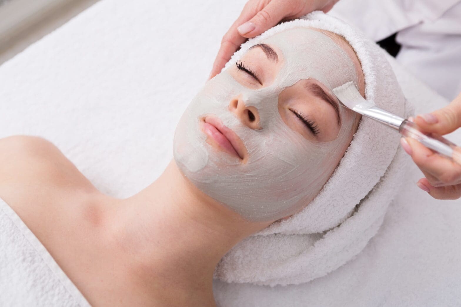 woman enjoying an express spa treatment in a relaxing environment