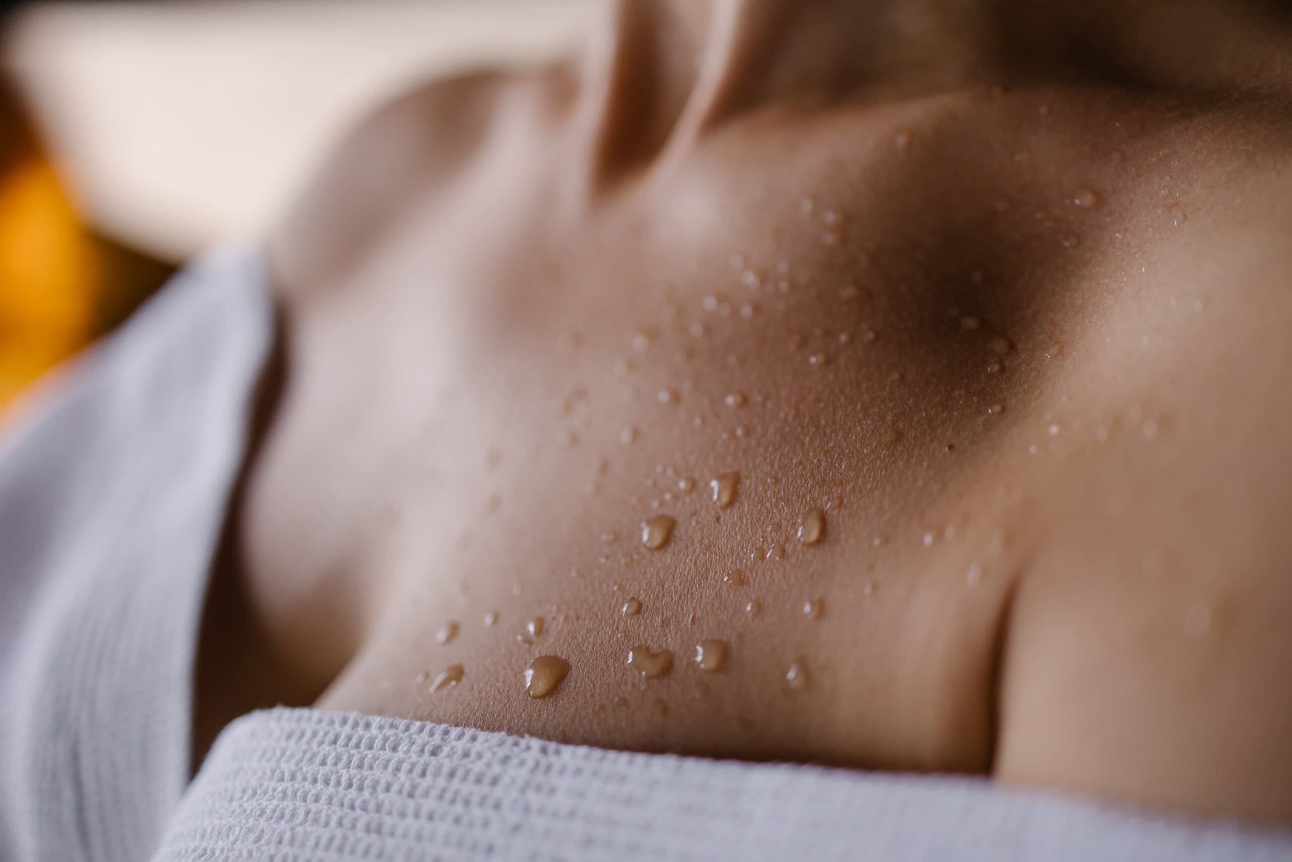 close-up of skin perspiration during sauna detox