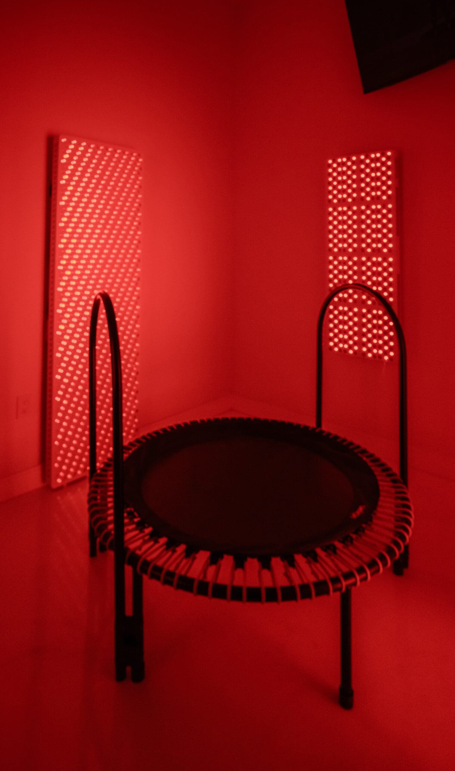 Relaxing spa room prepared for rebounder therapy and wellness treatments