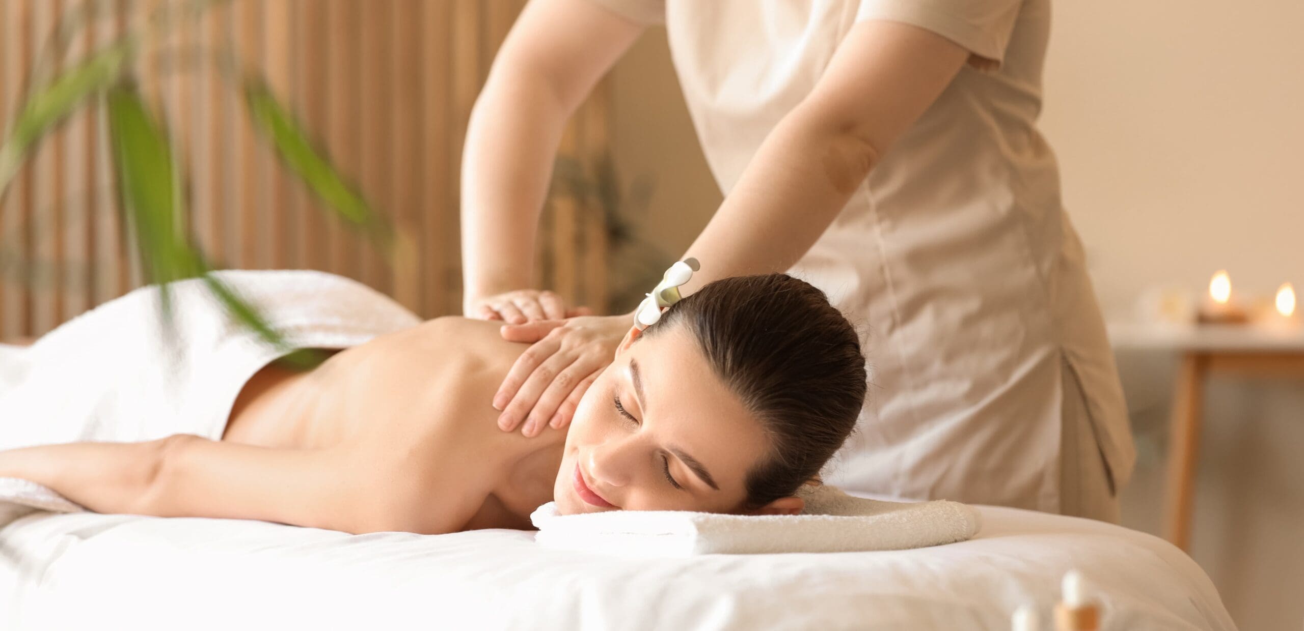 Lymphatic drainage therapy shown with gentle touch for detox and wellness