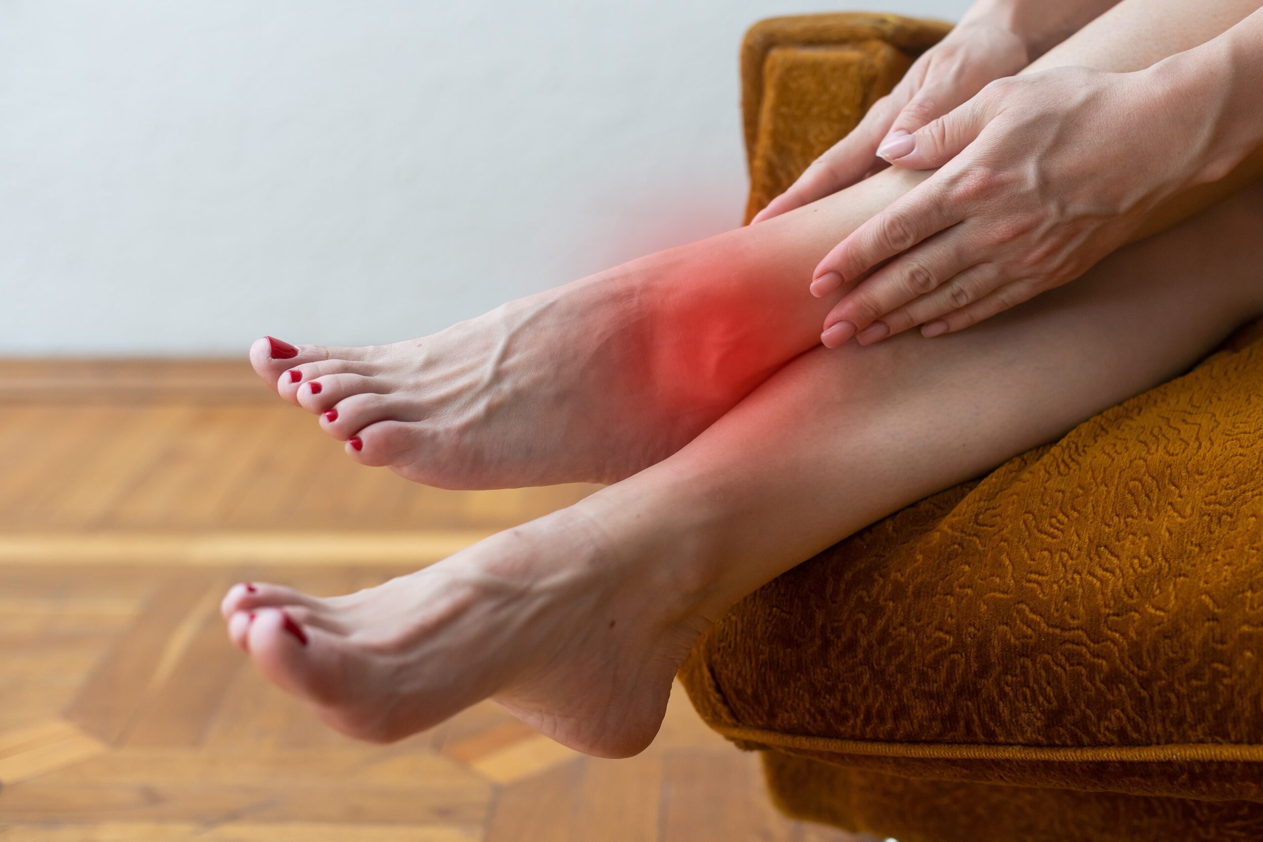 A woman dealing with heavy, tired legs, seeking a Heavy Leg Solution.